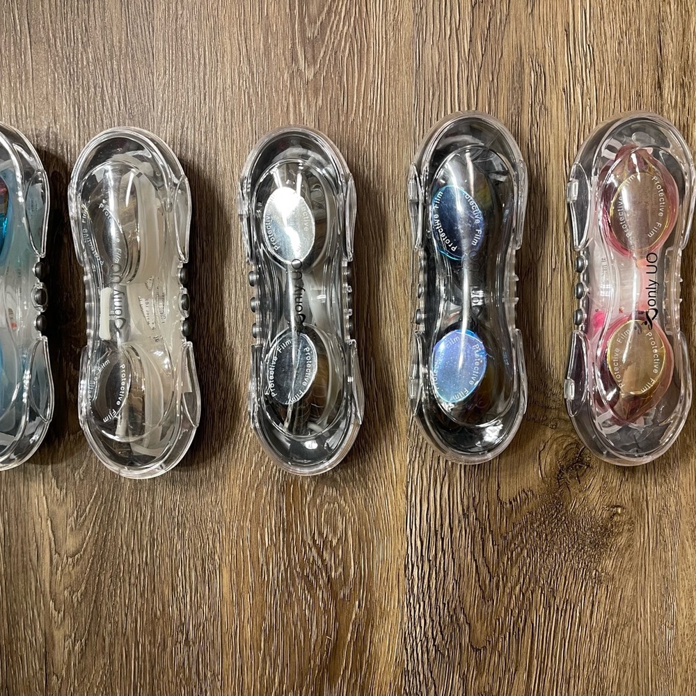 Brand new. Swimming goggles with case